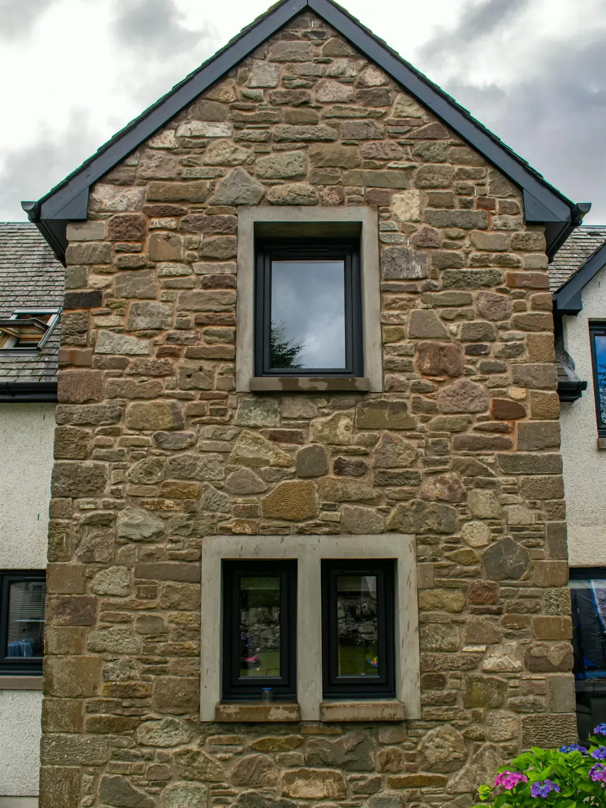 Anthracite grey aluminium casement window installed in a Dundee home