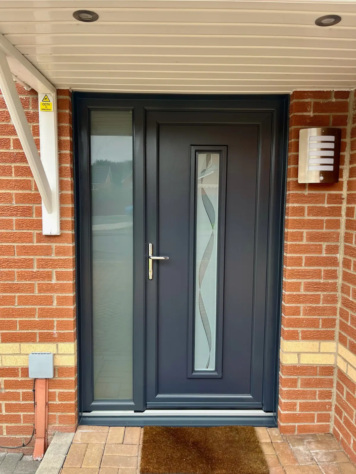 Anthracite grey PVC front door installation, Dundee