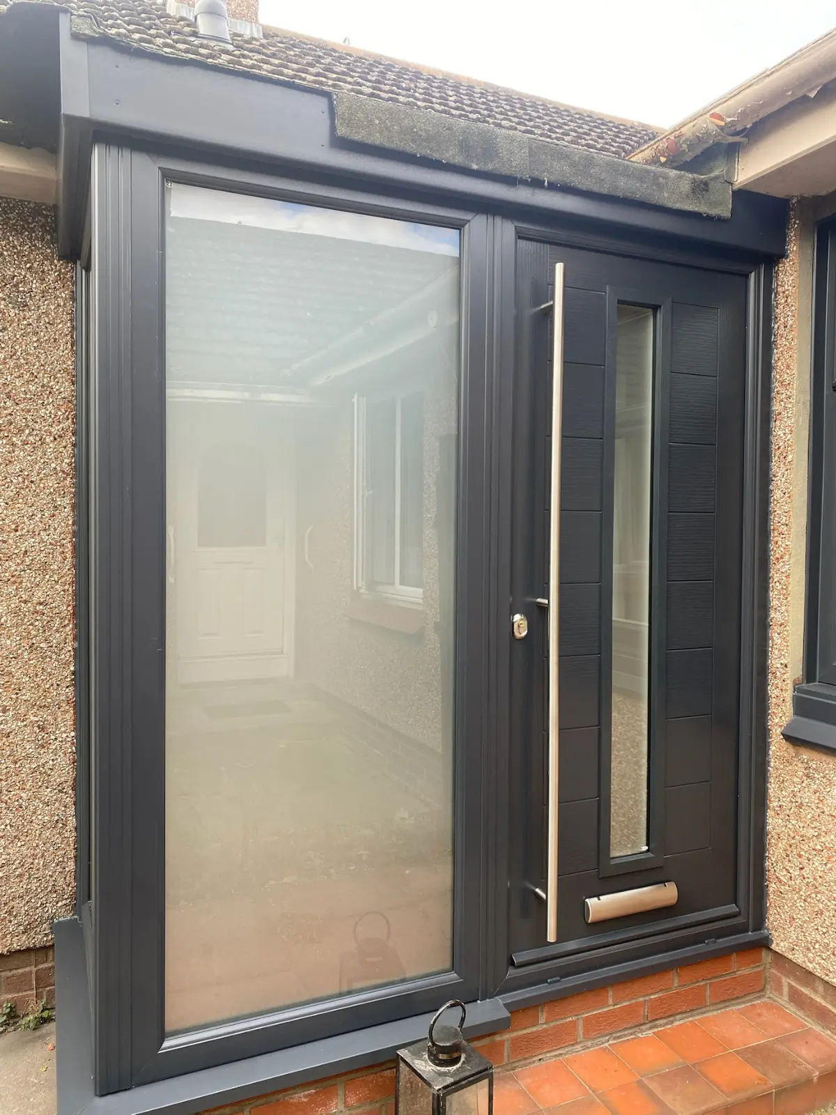 Anthracite grey composite front door installation, Dundee