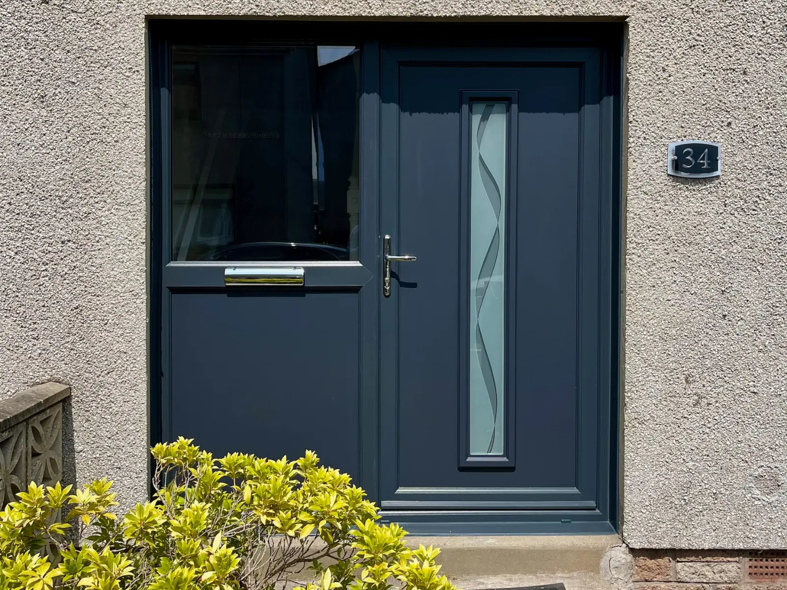 Anthracite grey PVC front door installation, Dundee