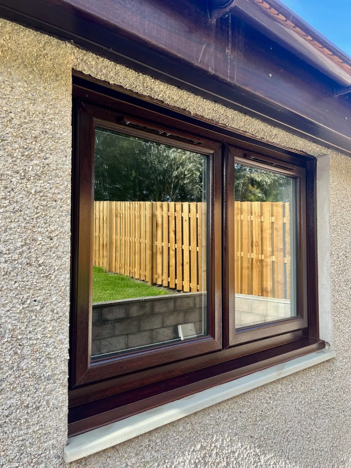 Dark oak uPVC casement window installation, Dundee