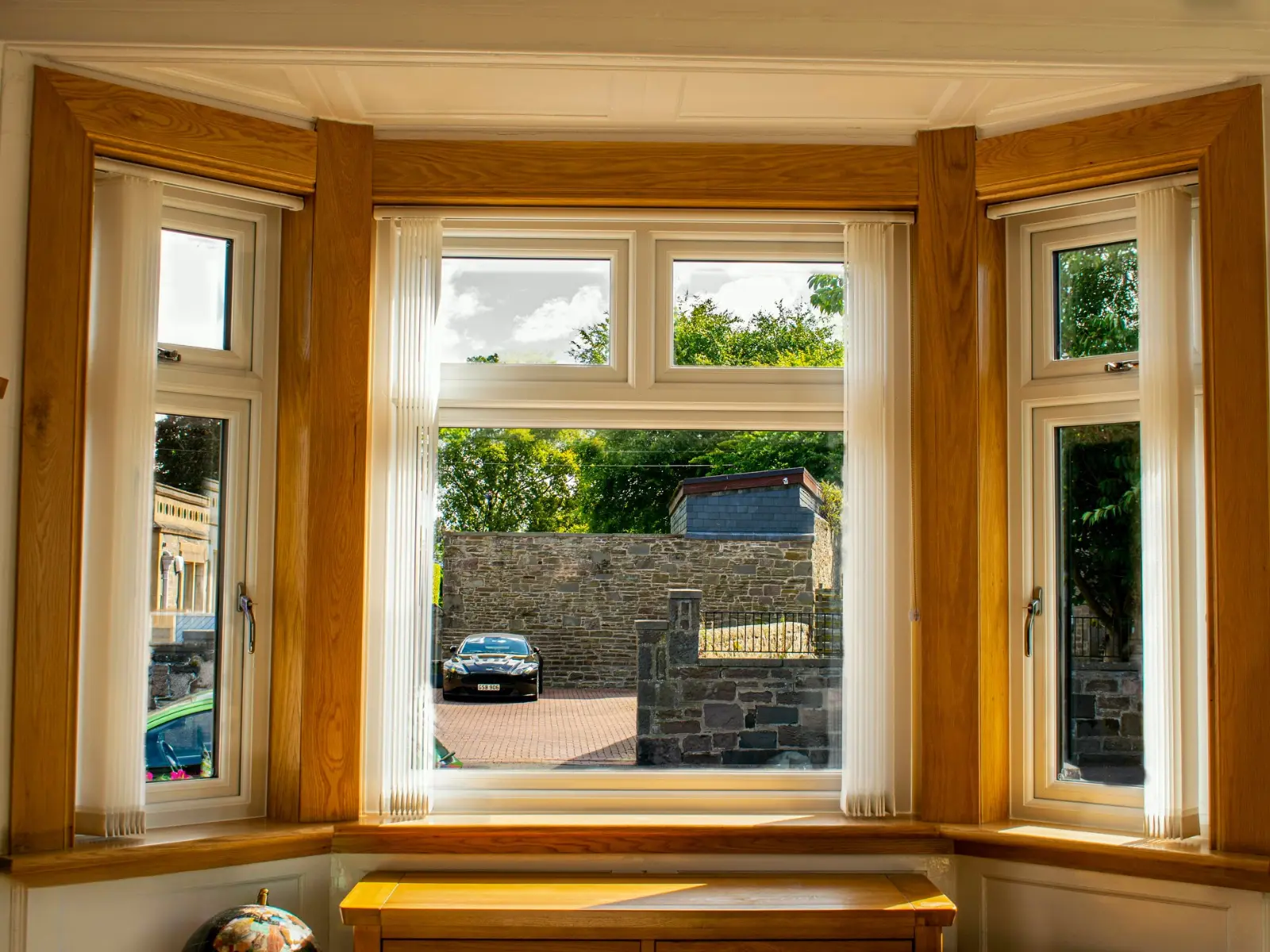 White uPVC bay window installation, Dundee