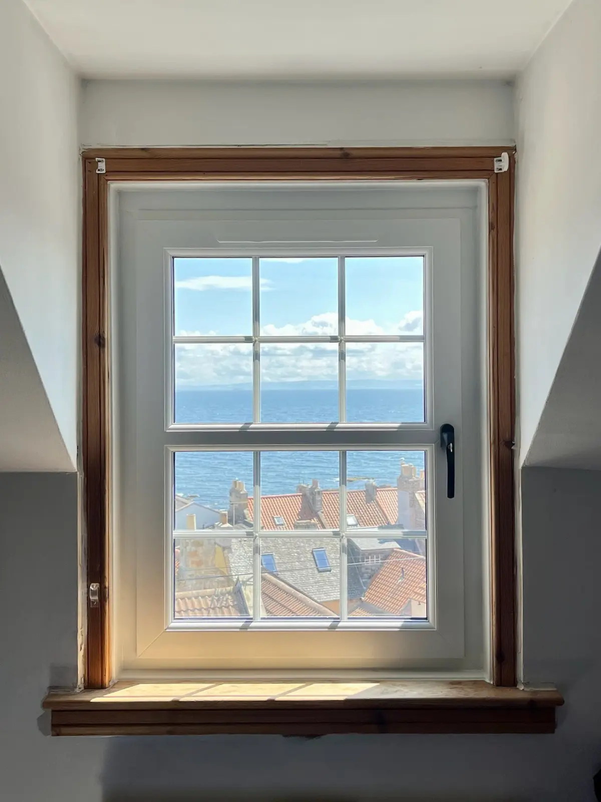 White uPVC tilt & turn window installation, Dundee