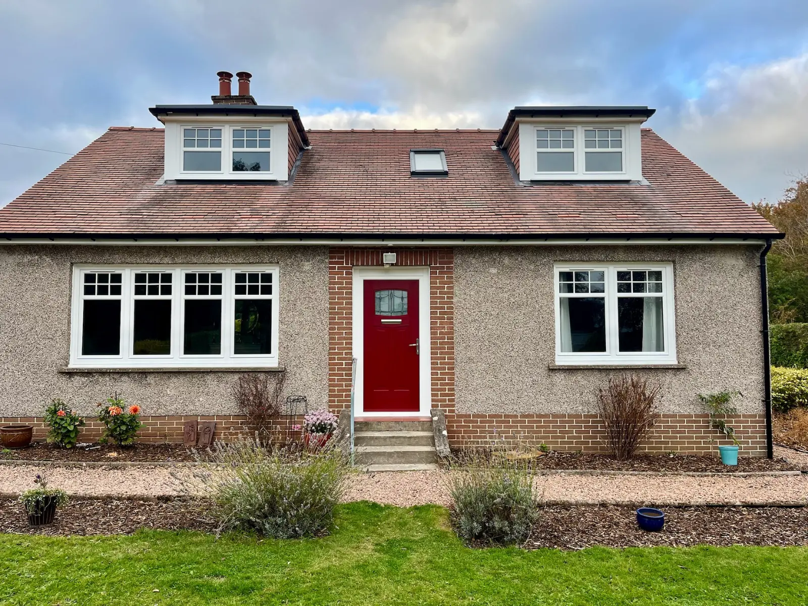 White uPVC casement windows and red composite door installation, Dundee